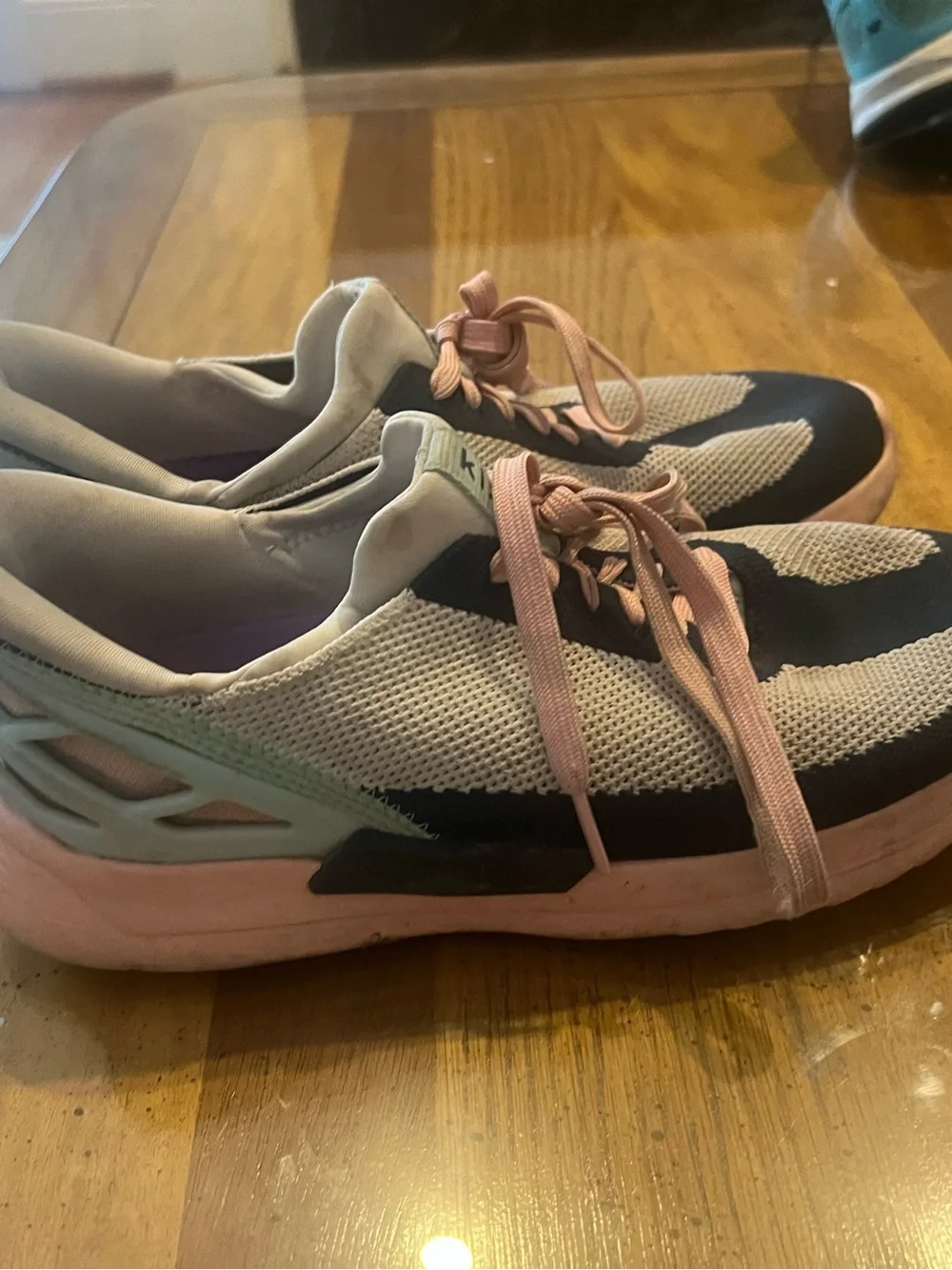 Kizik Women’s Pink and Black Knit Slip-On Sneakers